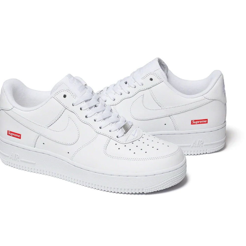 Supreme White Athletic Shoes with Red Highlights